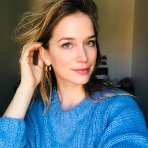 Elizabeth Lail Instagram - These are my aquamarine earrings whispering in my ear to be kind and VOTE. @shiffonco and @whenweallvote created these VOTE hoops to celebrate the brave women who jumped through hoops for our right to VOTE. #hoopstovote #wearthechange *Each pair funds critical voter outreach*