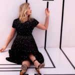 Elizabeth Lail Instagram - Thank you @nkdmag and @catherinepowell for this shoot and story. I feel like Alice in Wonderland/Phoebe from Friends/Torrence from Bring It On in this picture Xx The Color Factory