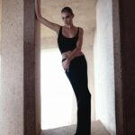 Elsa Hosk Instagram - @helsastudio minimal 90s drop is live!!❤️‍🔥❤️❤️‍🔥 gratitude is the attitude… getting to do this as my job is unreal to me. Putting my soul into each of these pieces. They may only be clothes but to me they’re designed as armor to make me feel like the most badass, the most comfortable, the best I could feel to tackle this life. The late 90s was my first introduction to fashion and I remember the ease, simplicity and effortlessness that’s shaped my own style ever since. Pants that don’t squeeze, the fabrics that were simple but great quality, the dresses that were effortless yet cut a striking silhouette paired with makeup that was minimal and slightly imperfect, either a bare face or a smokey eye like you’d quickly done it yourself. The best from the 90s that still feels ageless today. That’s always been my goal with Helsa, to achieve that slight nostalgic feel that’s classic but feels so special. Pieces that surpass the trend of the season and become your part of your closet for years to come. Helsas 8th drop is my ode to 90s minimalism whether it’s dressed up in a long white deep V tie dress a la Kate moss, or a casual yet ultra chic pink poplin wrap shirt and a gray oversized trouser. You’ll find everything in this collection, comfortable organic cotton slacks paired with the softest jersey base layers, poplin shirts in different shapes, compact knit dresses in black and white and tan. Easy wrap skirts and and a new lighter workwear. I hope you love this drop!! Shop before it sells out on @fwrd & @revolve ❤️ Photography @yuliagorbachenko Makeup @leahdarcymakeup Hair @panosphair Producer @aimeesorek Styling @hoskelsa @mel_issy