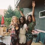 Emily Bett Rickards Instagram - This was 30 and though I can’t remember what drink I’m holding I do remember how yummy it felt to jam out at last years Yoga Party🎉 So we’re doing it again tomorrow at 10 AM PST! Sign up now at the link in my bio and support love, pride, and the YOUTH of our WORLD with your ticket! All proceeds go to @itgetsbetter - @op_e___n will be donating another $1 per person and I will be matching the total! Please don’t miss the chance to come flow with @allymaz and celebrate being in the world together! ❤️🧡💛💚💙💜 P.S. bring your best pals! Xx