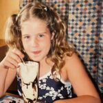 Emily Bett Rickards Instagram – My favourite gourmet meal as a kid was at Swiss Chalet. It involved crayons and a guaranteed overdose in dairy. Here is actual footage of me repping a bathing suit to dinner at a strip mall somewhere in British Columbia enjoying my dream birthday meal and developing lactose intolerance. 
And though milk is no longer invited to my birthday party you most certainly are! Tip tap the link in bio to join me and my beautiful friend @allymaz as we stretch, flow and empower the rainbow with all our donations going to @itgetsbetter 🏳️‍🌈 🎉 🧘‍♀️ 
SATURDAY JULY 23rd @ 10 AM PST invite everyone you love including your fur babies!
I love love love you all. 
XX