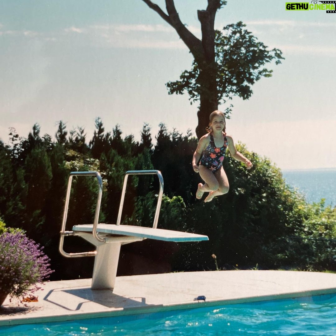 Emily Bett Rickards Instagram - So I have made it back from the woods with all limbs attached, just in time to stop Diane from revealing the frizz ball that was me from 1991 till debatably right now… This slick doo pictured here was a rare moment in my childhood courtesy of chlorine and no tears L’Oréal 🐠 This weekend Im jumping into 31 with a party brought to you by @allymaz and @op_e___n dedicated to @itgetsbetter Please join us on SATURDAY JULY 23rd @ 10 AM PST for bendy dance moves and pride! Fist bump the link in my bio, get a ticket, and invite your pals so we can all support the youthful, powerful and incredible LGBTQ+ coming up in the world right now! No L’Oreal can help me now, it’s my birthday and I’ll cry rainbow tears of celebration if I want to 😘😘 LOVE YOU!