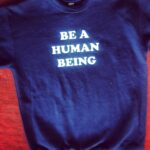 Emily Bett Rickards Instagram - • BE A HUMAN BEING • I don’t know where to start but this feels like the only place... This morning I searched in my closet for this sweater, unaware as to why I felt I needed this mantra today. But it is without a doubt because of the injustice, racism and discrimination that continues to go on ignored and repeated in our world. Racism and hatred have NO PLACE here. So WHY does it continue to infect the HUMAN RACE? Why does it continue to take INNOCENT LIVES of our fellow people? Why has it not been abolished completely? If we want a different world than the one we keep seeing, we have to change what we’ve been doing. We’re talking about murder. Death. Blood. Racism. Hatred. These are real monsters of our world and they need to be stopped. Talk to your friends, your family, your fellow people. Listen and learn. Bare the uncomfortable conversations the ones that make you scream out in pain and outrage. Because those conversations, those screams can save lives and make a change. This mantra is for yesterday. Today. Tomorrow. It’s for every single fucking day. The only race that exists is the HUMAN RACE it’s time we start acting like it. Planet Earth