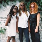 Emily Bett Rickards Instagram - This photo was taken outside a graveyard in New Orleans after a @fantasesay birthday brunch. I have polaroids of her surrounded in balloons smiling up at her September sun in the southern sky before we traipsed through the streets filling our already stuffed souls with jazz, deep fried pastries and orange cream slushies. I drank so many my hair increased in vibrancy and as it turned up it’s power I learned that redheads attract other redheads like magnets. I also learned that deodorant and probiotics are paramount and I swore to myself that if my gluten intolerance ever goes dormant the first thing I'm doing is grabbing these two and soaring straight back to NOLA. PSA to all our friends- Even though September is still a few months away  please remember Fantas birthday usually lasts a month and no matter how prepared you think you may be for Virgo SZN it always comes in hot, without warning and demands us all to have a good time. Hydrate, be prepared and have a great summer y'all.