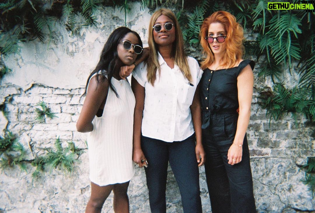 Emily Bett Rickards Instagram - This photo was taken outside a graveyard in New Orleans after a @fantasesay birthday brunch. I have polaroids of her surrounded in balloons smiling up at her September sun in the southern sky before we traipsed through the streets filling our already stuffed souls with jazz, deep fried pastries and orange cream slushies. I drank so many my hair increased in vibrancy and as it turned up it’s power I learned that redheads attract other redheads like magnets. I also learned that deodorant and probiotics are paramount and I swore to myself that if my gluten intolerance ever goes dormant the first thing I'm doing is grabbing these two and soaring straight back to NOLA. PSA to all our friends- Even though September is still a few months away please remember Fantas birthday usually lasts a month and no matter how prepared you think you may be for Virgo SZN it always comes in hot, without warning and demands us all to have a good time. Hydrate, be prepared and have a great summer y'all.