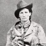 Emily Bett Rickards Instagram - Calamity Jane, born Martha Jane Canary was a frontierswoman, an adventurer, a performer, a fighter and even a nurse during a turbulent era known as the Wild West.  Studying her life there seems to be no break from pain or courage. She defied social norms and relentlessly demanded to have a place in history. In 1880 she was Americas “most famous woman”, arguably the first heroine of the United States. Plays were written about her in the East and New York newspapers called her “The Queen of the Plains”. She was the “female cowboy” that every townsfolk wanted to grab a drink with and every journalist wanted to speak to. That would explain the pictures we have of her, especially the one where she is standing in front of Wild Bill Hickoks grave. This photo helped cement the infinite lore that these two legends were in relationship, though some accounts say they rode into town once together and that was it. I’ve thought a lot about when the persona of Calamity Jane became most if not all of her and if at times it was more of a burden than she bargained for. Sitting on my computer in my comfy bed drinking matcha next to my snoring senior dog I have the luxury of considering this, where as I assume Jane was too busy trying to survive. Jane died at the age of 51 most likely due to excessive drinking but if there’s one thing I can gather from the internet it’s that she embodies the saying “larger than life” even in death. As we get further from places in time we realize the information we have is most likely skewed and that history was always written form the victors POV. There are others stories that have yet to be revealed from this era. I encourage the filmmakers of today to dive into the rich unpredictable rhythm of the Western frontier, for until we have access to time travel… we have movies. Kamloops, British Columbia
