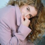Emily Bett Rickards Instagram - I stole Riley’s New Year’s Eve suit from his closet only to find out it still smells like body glitter from ringing in 2023.