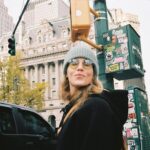 Emily Bett Rickards Instagram - New York is a rat running across my flip flop in the summertime, getting caught eating a sandwich in a torrential downpour, carrying bikes up my 4 story walk up, getting locked out of said walk up in the middle of the night, sweating my tits off on stage, broken air conditioners, sweating my tits off on the street, late trains, sweating my tits off, R-rated “cat calls”, $30 watermelons?!!??!?, and crying in the streets, the theatre, at home, on public transport, to a stranger, to my mom, to @cadlymack, with @emrellz and presumably with that rat. I miss you you NYC. See you in 2023. Portra 400 35mm