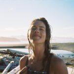Emily Bett Rickards Instagram - Hi! It's me, your friendly neighbourhood beach troll here to remind you (and myself) that the sun will melt away the blizzard one day. SO lets leave a better campsite than the one we found. We are all visitors here. XX Portra 400 35mm