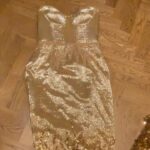 Hannah Waddingham Instagram - Finally a chance today to pause and appreciate the unbelievable work done on this magical privilege of a gown for our wonderful,fulfilling night @sagawards albeit virtually! @dolcegabbana and their flawless team handmade this beauty in Milan for me! Mind blowing. The gown weighs 22 pounds and took about 210 hours to create…..features 3,000 Swarovski bead fringes, 10,000 Swarovski crystals, 30,000 sequels and 40,000 Miyuki beads. How does one do this justice?! By obsessively videoing it on my hotel room floor at 4am,by myself,unable to take my tired eyes off it like a magpie,that’s how!!! From the bottom of my heart, to @luciodirosa and Holly G, @jamesyardley for creating this alchemy and everyone that wrecked their fingertips making this,I’m eternally grateful for your artistry. To @debeersofficial for my goddess jewellery that I TOTally wanted to steal and quite frankly nearly did!… and to my hair&make up for absolutely coming up to meet the dress and jewels head on @lewis_pallett & @hannahmartinmakeup ..Not an easy ask,but achieved to the max nonetheless….you are the very best at what you do. Finally to the truly gifted touch and imagination of @josephsinclair my photographer.Yowzers,I’m a bit awe struck. Thank you Sir. X Now……How the hell do we all top this!?! 😂🙏🏻❤️ Claridge’s