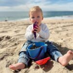 Heather Rae El Moussa Instagram - The boys in their element 🥹 These are the natural, candid moments that are special to us... Lots of time spent at the beach, on walks, lounging on our couch, playing at the park, sibling quality time… It’s been a BUSY few weeks but these are the moments that matter the most. 🤍
