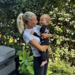 Heather Rae El Moussa Instagram - All 3 of the kids have made me a better person in different ways. I got my feet wet with Tay & Bray & then Tristan’s sweet soul chose me to be his mama. The kids have given me different perspective of life. There is a different purpose when you become a mother, you think different, you feel different. Life is more fun, but scary, I worry about things I’ve never worried about before. It’s chaotic but it’s beautiful chaos. I barely rest, I never have lazy days. Some days I miss that. But the alternative is SO much better. 🤍 Swipe to see life lately of Tristan Bear. 🐻 A few updates: He says mama, dada, dog & is trying to say other things. He’s taken 2 steps but not walking yet. He gives kisses & hugs. He loves being outside. He’s so sweet but strong willed. He loves pacis and drinking water. 😊