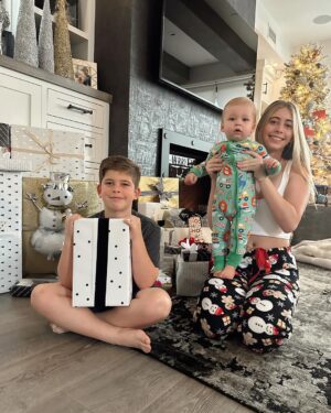 Heather Rae El Moussa Instagram - Merry Christmas from the El Moussa family ❤️ There’s nothing better than waking up on Christmas morning, looking around and feeling like you already have everything you could want. Family is truly everything - We hope you all get to slow down a little today to be with your loved ones! It’s Tristan’s first Christmas so we’ll definitely be soaking every moment in with our crazy little monsters 🥰