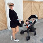 Heather Rae El Moussa Instagram - Embracing my most natural self while always working on improving 🤍 Mom life has been a lot about getting “me time” in where I can- workouts that used to be in yoga studios or running on the streets of Newport are now in the middle of our living room, weights have been replaced with holding Tristan😂, and different pieces of furniture have become workout machines. My mindset is get it in when I can where I can and that’s been what’s working for me plus T loves our workouts, he giggles the entire time 🥹 Newport Beach, California