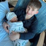 Heather Rae El Moussa Instagram - Happy #Nationalsonsday my sweet Tristan bear 🤍 I am so honored to be your mom - You have made me a better person. There’s nothing I love more than being a mama & bonus mama 💙 These boys have made me more fulfilled than I could have ever imagined. Celebrating from NYC so kisses through the phone!! 😚 Peek the boogie 😂