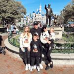 Heather Rae El Moussa Instagram - When the 5 of us try and take a photo together, you already know it’s going to be chaos 🙈 Sun in our eyes, bad lighting, kids getting antsy… the struggle is real 🤪 But we had so much fun celebrating Tristan’s 1st birthday at Disneyland!! It was so fun being there as a family and seeing Tristan’s face light up at all the rides was the cutest thing 🥹 Happiest place on earth for good reason 🤍🤍