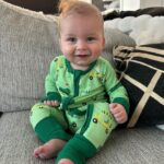 Heather Rae El Moussa Instagram - Friday mood: 😜 I blinked and he’s already sitting up all by himself, smiling for the camera giggling non-stop, and he has two teeth that came in & 2 more piercing through 🥹 Swipe for cuteness 🤍