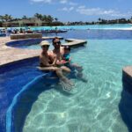 Heather Rae El Moussa Instagram - Never a dull moment 🤪 with family AKA the Griswold’s. We went to Cabo last year to this exact spot - @theheatherraeelmoussa was pregnant with Tristan so she stayed back, so this year we had to do it all over again! Taking meaningful trips like these, waking up with all of the kids smiling ear to ear (even Tristan:)), and spending QT with our families is the best feeling in the world. Making summer memories with the whole family & some close friends, swipe to see a few that we captured ❤️