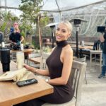 Heather Rae El Moussa Instagram - Some BTS of my House Hunters: All Stars episode airing TONIGHT! My crew brought out the “diva” in me 😂😜 Tune in to see which beach house my clients chose! 🏝️Tune in at 8/7c on @hgtv!