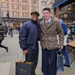 Ian Wright Instagram - Best dressed man in the West End today and he's a steam engine train driver as well. Had to get a pic with Charles 👌🏾🎄😎 Picadilly Central London