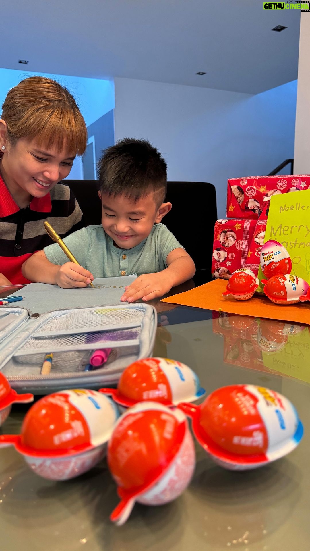 Isabel Oli Instagram - Starting our Christmas shopping early to beat the crowds! I’m a super grateful that my son helped me in wrapping some gifts. And for that, I’ll thank him by giving him his favorite KINDER JOY! Get some Kinder Joy and give it to your kids as a treat. You could even include Kinder Joy in the gifts you give out this coming Christmas.🎁 To make it more festive, did you know that there are Kinder Joy Christmas sleeves you can write on to? Find these when you shop for Kinder Joy this Holiday Season.🎄 #ad #KinderJoyPH Manila, Philippines