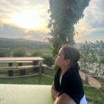 Isabel Oli Instagram – This tranquil scenery has captured my heart… aaaand him as well 🤍🤣 

#TravelWithThePratties #Tuscany Chapel of Our lady of Vitaleta