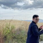 Isabel Oli Instagram - This tranquil scenery has captured my heart… aaaand him as well 🤍🤣 #TravelWithThePratties #Tuscany Chapel of Our lady of Vitaleta