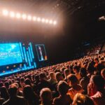 Jack Whitehall Instagram - First leg of the arena tour done. 👊 thanks to everyone who has come along thus far. Honestly some of the best crowds I’ve ever played to. 🙏 Also looking through @andrew_takes_photos_ photos and I have to say a big shout out to the team who designed it for me. It looks epic! I said I wanted it to have some visual impact and they have done me proud. Kudos to @mostlytom @vinchenzospoonjanja @johndodkin @_lukeavery Off to US for a week then back for some fun at @utilitaarenabirmingham @cardiffinternationalarena @nottinghamarena and then the big finale at @theo2london 😎🙌