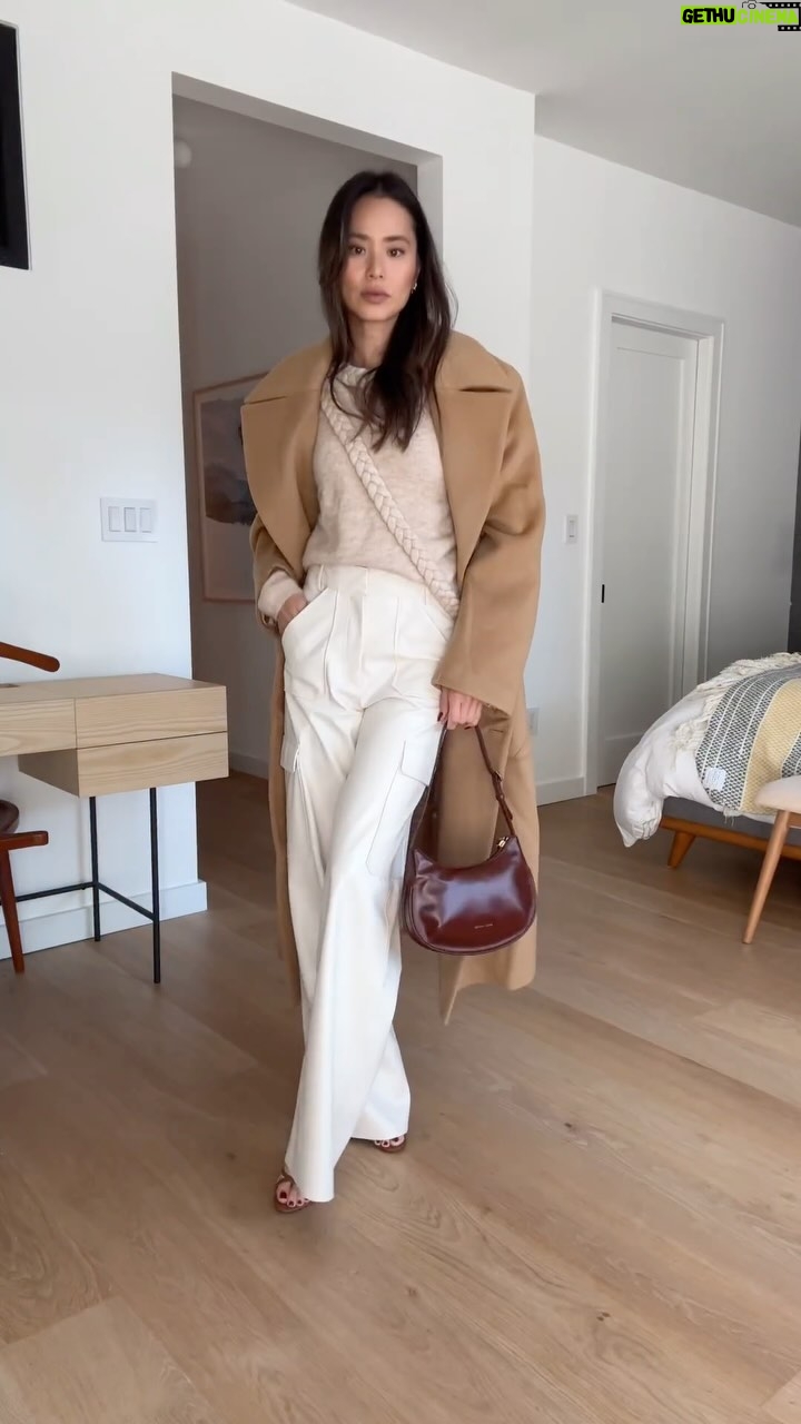 Jamie Chung Instagram - GRWM Knitted shirt @seanewyork Jeans @madewell Cream pants and sweater @oscar_the_collection Coat @elleme Bag @manu_atelier