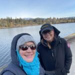 Jenna Fischer Instagram - Took a long 2 hour BFF walk today and my goodness this city is beautiful! It’s also coooold! I wore sweatpants OVER my jeans! Here we are by Lost Lagoon in Stanley Park. So pretty! Very excited for our live show tonight at the @jflvancouver festival. Tickets still available! Link in bio. 🇨🇦