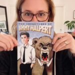 Jenna Fischer Instagram - It’s Classy Christmas Part 2 on Office Ladies today and we got the full story behind the creation of Pam’s gift to Jim - The Adventures of Jimmy Halpert from artist @tonerodriguez2000 (You are going to love this story @mindykaling ) Angela’s husband @joshuasnyder created an F Train to Brooklyn cocktail in honor of this episode and producer @cassijerkins might have finally freed the clacky balls. Link in bio and this will all make sense.