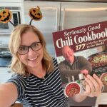 Jenna Fischer Instagram - It’s October!! Time for seasonal decorations and warm food in the crock pot…like maybe some Seriously Good Chili courtesy of @bbbaumgartner 👩‍🍳 My daughter made that vase and I filled it with fake flowers. We decorated this weekend together…head to stories to see how we did! 🎃