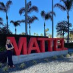 Jennie Garth Instagram - Speaking of @barbie…I got the ol’ gal out of storage for a little trip to her birth place @mattel to speak on behalf of @iheartpodcast about the big wide world of podcasting and the importance of sponsor relationships. Thank you for having me Will & Greg and loved sharing the stage with you @sisanie 💕 @iheartradio 1. When your shoes match the signage! 2. No prep necessary when you love what you’re talking about. 3. She has seen better days🙀🤣 4. Little tiny shoes for big giant brained girls! 5. My two biggest fans! @current_air