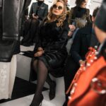 Jennifer Coolidge Instagram - Check out that second photo! A perfect face paired with a perfect design. @jonathan.anderson you have talent coming out of your ears. Thank you @loewe for the sexiest trench I've ever worn. Thank god I remembered to wear my fig leaf underneath - it's windy in Paris. ✨✨✨💕💕💕Photos by @augustasagnelli #parisfashionweek #loewe #jonathananderson #greatclothesworkbetterthandatingapps thank you to the whole LOEWE team! Jonathan, Kate, Isabel, Adrian, Pol, Boaz, Vincent and Irene!
