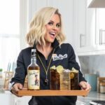 Jenny McCarthy-Wahlberg Instagram – What’s better than checking off my to-do list? Checking in with your friends! Grab a bottle of @BlackheartRum and tag a friend you want to get mixing with. 🍹 You won’t regret it. #cheersbeforechores #UpToSomethingGood#blackheart 🖤 #ad