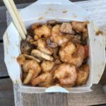 Jessica Barden Instagram - Tonight we are featuring @jamiepatricof favourite New York style Sichuan joint @genghiscohenla . I come here for the fried rice and all things shrimp, I also love their green beans, very crunchy and fresh! But of course everything is good and when it’s not covid time you can come here and get cocktails, listen to live music and just be a part of civilisation and share a space with strangers who all deep down have the same fears and dreams as you. Yay real life! The pink and black tiles of @genghiscohenla are an iconic sight as you drive around West Hollywood, you have probably driven past this place everyday! We ordered through @caviar which is why i am not masked up this time, just wanted to get a picture of the very pleasing pink and black tiles for you and document me wearing sunglasses that shockingly are not @gucci 😱 but in the past have used any of the well known take out apps and also called in to them directly! It’s a really great spot! Genghis Cohen