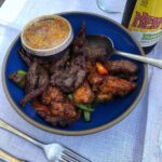 Jessica Barden Instagram - Today I am featuring @jitlada_la Thai restaurant in east Hollywood. This icon pictured here is @jazz_sing her restaurant has been bringing family recipes to the people of Los Angeles for years and years. Gods like Jonathan Gold and Ryan fucking Gosling alike have come here and eaten the pad thai and crying tiger and morning glory salad. We even saw @chefroychoi (more on this legend later in week) waiting in line to support this institution. Today we honor Chef Tui with a burnt mouth and chapped arsehole (if you don’t want the food spicy you gotta tell them because this place is legit) Shout out to @lilyrosenthal for the on point order 🤘🏼more in my stories for what we ordered and links to their menu! All hail Jazz!!! ✨ Jitlada Thai Restaurant