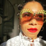 Kelly McCreary Instagram - I’d been saving these @orijinculture sunnies to make their debut on vacation... so here I come, sofa. 🌞 🌞 (Travel Fantasy Fabulousness by @orijinculture 🙏🏾🙏🏾)
