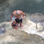 Kelly McCreary Instagram - #Fbf to this day last year when we were kinda sorta Chasing Waterfalls. Repost • @petechatmon #tbt IG Travel Show Edition: The “Sticky Waterfall” In Thailand. The Strong Flow Of Water Eliminates The Moss From The Limestone, Allowing You To Plant Firmly And Essentially Run Up The Falls [If You’re As Crazy As Our Tour Guide]. We Got The Hang Of It After This, Which Is Important, Since We Had About 800 Feet To Go And The Climb Got Much More Challenging.