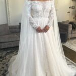 Kiana Madeira Instagram - The day I said “yes” to my ceremony dress 🥰 I had my eyes set on this dress from @luce_sposa since I first began my online search. Countless hours of Pinterest boards and ideas with @anandarose and still, this one was on the top of my list. When I went to @lizaraynewyork to try on dresses, this one wasn’t one that they had in store but they ordered it for me to come and try on at a different date. This is that day 💜 I knew as soon as I put it on. The butterfly details, the sparkle, the dramatic tassels on the sleeves, the elegance- I was in love!! For all of my brides-to-be: go with the dress that makes you feel beautiful. The one that you feel confident and comfortable in. Don’t worry about what other brides are gravitating towards. It’s your day to feel as wonderful and magical and beautiful as you are!! Which is VERY!! 🥰