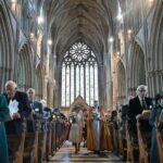 King Charles III of the United Kingdom Instagram - Today, The Queen presented Maundy Money to 75 men and 75 women in Worcester Cathedral in recognition of service to their local communities. Maundy Thursday commemorates Jesus sharing the Last Supper with his disciples and commanding them to  “Love one another as I have loved you.”  The tradition of the Monarch or their representative presenting alms on Maundy Thursday goes back to 1213.