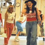 Kristin Chenoweth Instagram – October 20 marks 10 days until @wicked_musical’s 20th anniversary… be prepared to be absolutely sick of us for the next 10 days!!! Rehearsals in 2003… these outfits are officially back in style which I think makes us old @idinamenzel?? 💚🩷🧹 #flashbackfriday #wicked20 New York, New York
