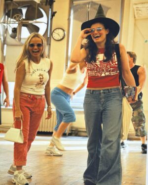 Kristin Chenoweth Instagram - October 20 marks 10 days until @wicked_musical’s 20th anniversary… be prepared to be absolutely sick of us for the next 10 days!!! Rehearsals in 2003… these outfits are officially back in style which I think makes us old @idinamenzel?? 💚🩷🧹 #flashbackfriday #wicked20