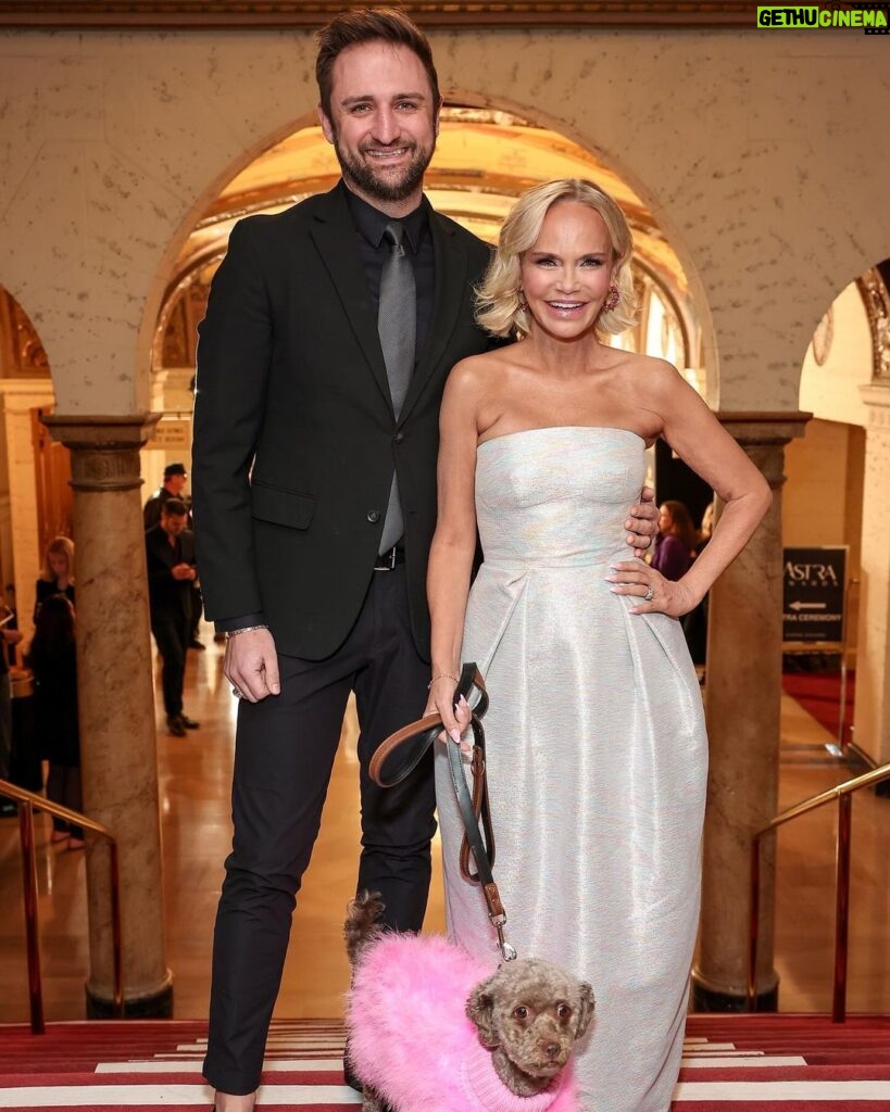 Kristin Chenoweth Instagram - family night out at the #astraawards!! 💖 #theastras @hollywoodcreativealliance Dress: @christopherjohnrogers Shoes: @gianvitorossi Jewelry: @swarovski & @considerthewldflwrs Thunder’s Outfit: @christiancowan Styles by @debswatson