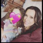 Lacey Chabert Instagram - My favorite days on set are when I get to sneak away at lunch and cuddle this little love bug 💕