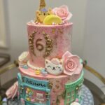 Lacey Chabert Instagram - My favorite hobbies are entertaining and arts and crafts, so I absolutely love planning parties! Julia chose the theme French Kitty for her party. Yes, you read that correctly. Her idea was a very fancy kitty who visits Paris for the day so that’s the theme we tried our best to capture 🤣 I ordered everything Paris and Kitty themed I could find. If you plan enough in advance you can get so much on sale/clearance at craft and party stores. I also saved a bunch by making the balloon arch, flower arrangements and many of the decorations myself. It’s a lot of work,but I love a #DIY project! I discovered that etsy is a magical place for personalized items. I found some wonderful artists there and I love supporting small businesses whenever I can. How incredible is the cake?! @singersisterssweets is a genius! Thank you Rebecca for your creating the most perfect cake! The best part of the day was seeing everyone together having a good time. It had been a while since we’d had a big party and we enjoyed making up for lost time. Lots of good memories were made 💕 Merci for celebrating with us!! #partyplanning #celebrations #decor #hobby #makingmemories