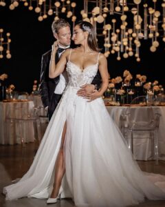 Lindsey Morgan Instagram - 🤍 #Repost @sophisticatedweddings ・・・ We admit it: we just can't wait to start sharing the images (and video) from our photo shoot at The Glasshouse with affianced (and breathtakingly gorgeous) couple Lindsey Morgan and Shaun Sipos. They're too good to wait until mid-September for the release of our Fall/Winter Edition. With that in mind, today's blog post on the LIFESTYLE page of SophisticatedWeddings.com has a bunch of second choice photos and behind-the-scenes video to hold us all until the new issue comes out! pictured: venue: The @Glasshouses.NYC bride: @LinzzMorgan groom: @Shaun_Sipos photo: Marcin Pawlowski for @CharmingImages cinematographer: @ShuttersoundPics designs: @PremierEventsByReema furniture rentals: @Christina_AFRnyc dress: @MillaNova for @BridalReflectionsNY custom tuxedo: @Sartoro.co jewelry: @WilliamBarthman headpieces: @BridalStylesBoutique makeup & hair: @BridalGal # # #SophisticatedWeddings #LindseyMorgan #ShaunSipos #Wedding #WeddingPlanning #Engaged #GettingMarried #BrideAndGroom #HereComesTheBride #YouMayNowKissTheBride