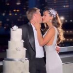 Lindsey Morgan Instagram - Practice for the big day ✨ Thank you for this incredible team and shoot, excited to see the published images in @sophisticatedweddings Fall issue Venue: @Glasshouses.NYC Photographer : @CharmingImages cinematographer: @ShuttersoundPics Event Design: @PremierEventsByReema  furniture rentals: @Christina_AFRnyc Dress: @paulahian tuxedo: @Sartoro.co jewelry and time pieces: @WilliamBarthman  headpieces: @BridalStylesBoutique makeup & hair: @BridalGal Cake: @CitySweetsNYC Bentley: @MVlimo Champagne: @MoetChandon