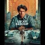 Meenakshi Chaudhary Instagram – Here’s the first look of our ambitious #LuckyBaskhar!💰🏦

Story unfolds in Telugu, Malayalam, Tamil & Hindi at the theatres near you, soon! 🔥 

@dqsalmaan @venky_atluri @gvprakash  @nimishravi @NavinNooli @benglann @nagavamsi19 #SaiSoujanya @sitharaentertainments @fortune4cinemas #SrikaraStudios