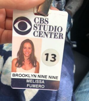 Melissa Fumero Instagram - 8 years ago, @beezus218 walked me, @stephaniebeatriz & @chelsanity to get our pictures taken for our lot badges. Something about that moment made everything really real- we actually made that pilot, it actually got picked up, we actually were about to shoot a whole season of this incredible show on this lot with this amazing cast that I was falling in love with more and more each day. Filled with so much excitement and nerves, Chelsea said something that made me laugh right as the photographer clicked the camera… and that moment was predicative of what the next 8 years would be like. Each day was full of laughter, of excitement, of nerves, of confidence, of elated exhaustion, and of beautiful friendship & collaboration. #Brooklyn99